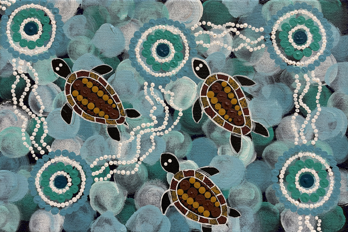 Turtles swimming in the Ocean by Peta Curley